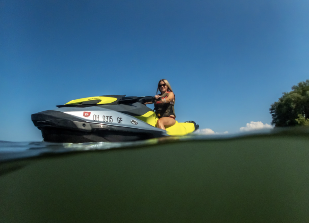 Woman riding jet ski in Lake Erie.